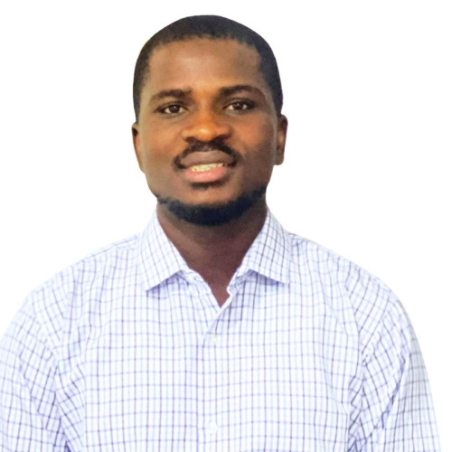 Zakariyau Yusuf stands to get his headshot taken, the background has been removed and turned into a white background.