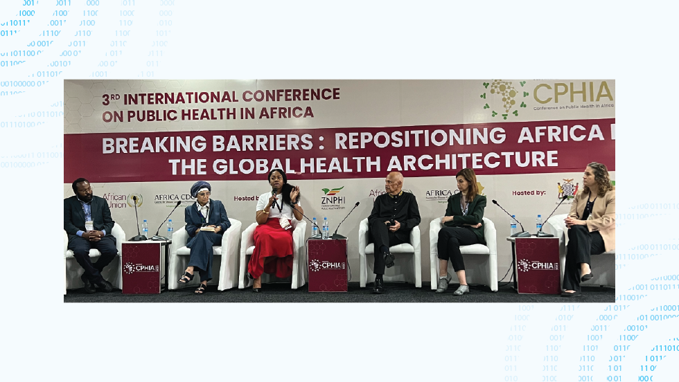Conference stage for Public Health in Africa with panelists sitting in a row